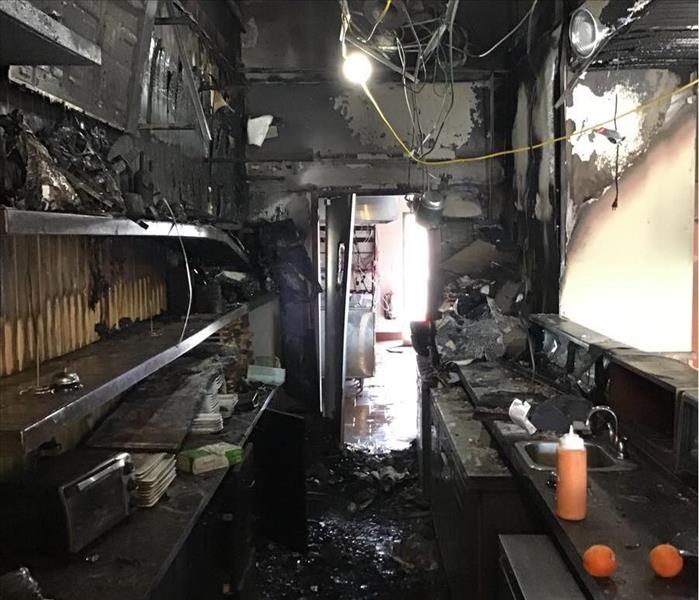 Sushi Bar Fire caused walls to get completely Covered in Soot and Smoke Damage