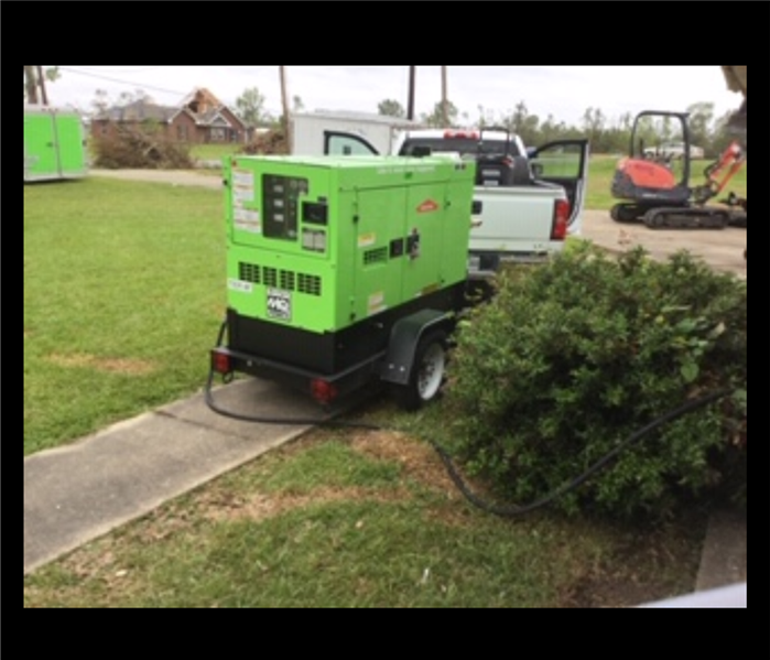  Truck with Generator ready to Pick up Storm Debris